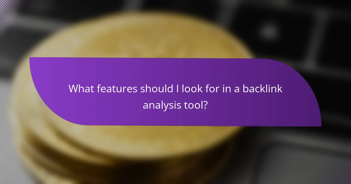 What features should I look for in a backlink analysis tool?